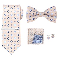 Accessoires de mariage haut de gamme pour homme de style britannique : Ensemble cravate, pochette et nœud papillon rayés pour occasions formelles