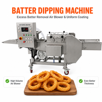 Machine à paner continue pour ligne de panage et d'enrobage des snacks dans une usine de produits surgelés
