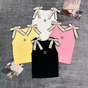 Top Corto Senza Maniche in Maglia a Costine con Fiocco e Logo, Traspirante, Tinta Unita, Taglia Unica, per Donna, Stile Casual e Sportivo - Product Image 1