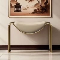 Fauteuil d'appoint moderne minimaliste de luxe léger avec structure en métal et siège en cuir véritable pour la salle d'attente, le changement de chaussures et le salon