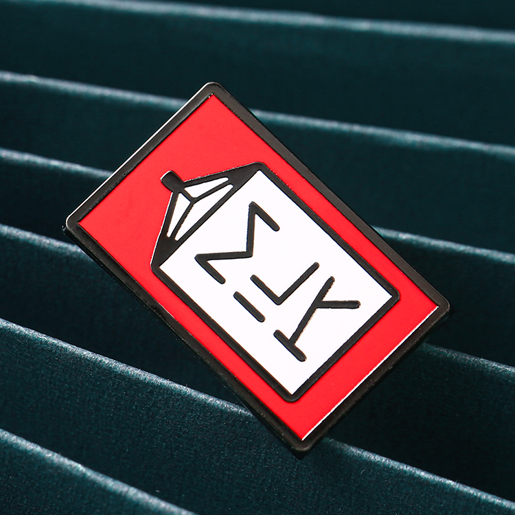 หมุดเคลือบตัวอักษร