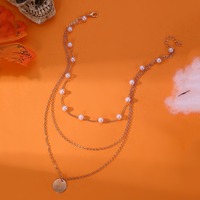 Mode Alien Perle Gland Collier Polyvalent En Gros Personnalisé Plaque Ronde Pendentif Multi Couche Portant Collier