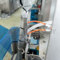 Machine d'emballage de sachets à trois soudures pour sauce tomate et pimentée à grande vitesse, capacité de remplissage de 10 à 65 sachets/min