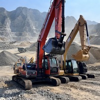 En stock, excavatrice Doosan DX225LC d'occasion, idéale pour les travaux d'ingénierie municipale, l'excavation de chantier et la remise en état des terres