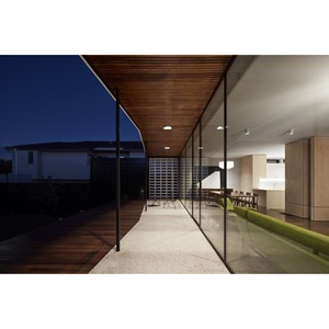 Villa moderna de acero con paredes de vidrio y paneles perforados para uso residencial - Product Image 2