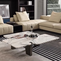 Design créatif Table basse italienne minimaliste irrégulière Table basse moderne pour salon en marbre