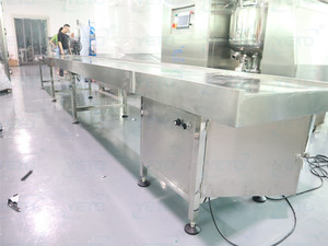 Chaîne de production et d'emballage automatique en acier inoxydable pour bouteilles cosmétiques, boîtes, bidons et pots, avec machine de transfert - Product Image 3