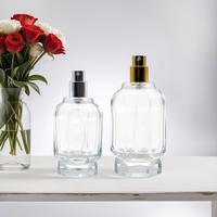 Fabricant sur mesure vente en gros 50ml 100ml atomiseur de pulvérisation en forme de cylindre rond fantaisie bouteille en verre de parfum vide