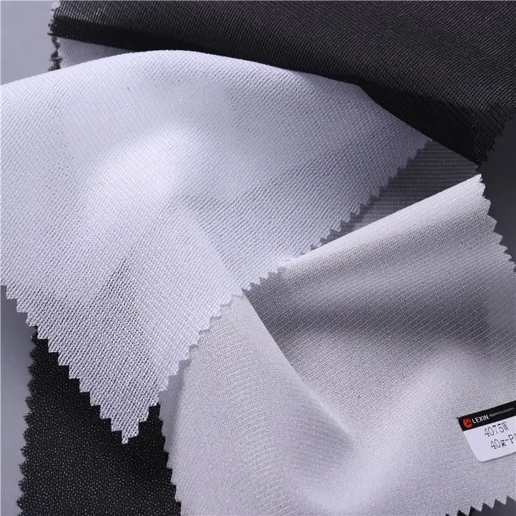 Ingrosso Design sparso ordito in maglia di poliestere elastico intrecciato tessuto fusibile Interlining Interlining