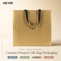 Sac cadeau de luxe personnalisé avec logo, poignée en ruban satiné et estampage à chaud doré pour emballage cadeau de boutique