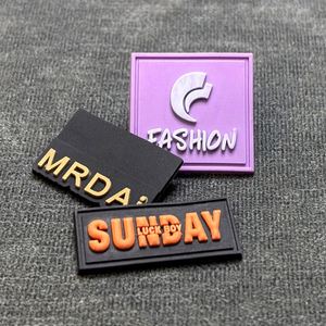 ป้ายยางซิลิโคน PVC แบบนูน 3 มิติ สำหรับเสื้อผ้า ป้ายยาง PVC ติดเสื้อด้วยความร้อน - Product Image 1