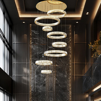 Grand lustre circulaire en cristal LED de luxe pour l'éclairage des escaliers de villas intérieures