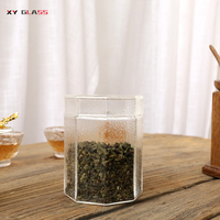Pot en verre fait main à motif de marteau durable à haute teneur en borosilicate pour le stockage des herbes, du thé et du sucre.