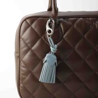 Meilleures ventes : Collection de breloques et porte-clés en cuir PU, tressés et tricotés, avec nœuds de corde colorés, pendentifs souples, pampilles et design minimaliste
