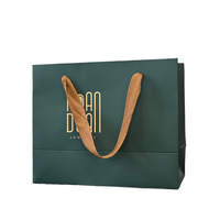 Sacs de shopping de luxe en papier couché/carton ivoire écologiques avec poignées en ruban, logo personnalisé imprimé, recyclables en gros