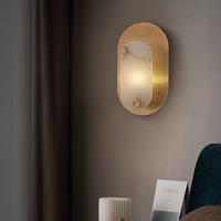 Applique murale LED d'intérieur en laiton blanc chaud pour chambre à coucher et salle de bain, moderne, en marbre alabastro, ovale, télécommandée, à fixer au mur