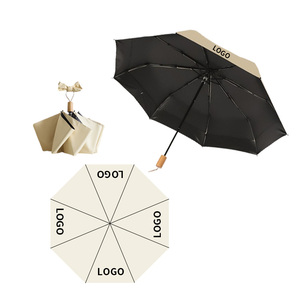 Hot Sale <strong>Portable</strong> Black Vinyl Three-Fold Sun Protection Folding <strong>Umbrella</strong> with Wooden Handle - Product Image 1
