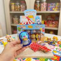 Œufs de chocolat solides multicolores en forme de personnages de dessins animés, biscuits, jouets, boîte de 24 pièces pour les fêtes d'enfants, vente en gros de bonbons