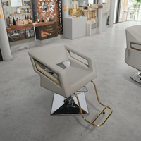 Nouveau produit Chaises de barbier en cuir gris Sulin avec tabouret doré pour salon