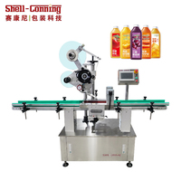 Machine d'étiquetage automatique professionnelle pour bouteilles et canettes de l'industrie alimentaire, personnalisable en usine, avec système de serrage automatique et étiquetage plan.