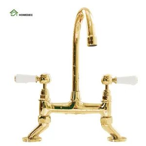 European high quality copper gold double hole double lever hot and cold sink taps rotatable kitchen faucet