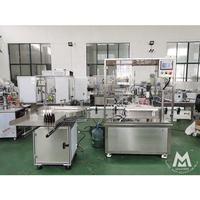 Machine automatique de remplissage et de bouchage de flacons compte-gouttes pour huiles essentielles