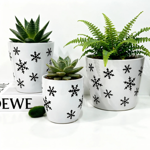 Vente chaude 2026 : Pots de <span class=keywords><strong>fleurs</strong></span> coniques en céramique blancs à motif flocon de neige noir, directement de l'usine, pour la décoration de Noël et l'aménagement intérieur - Product Image 4