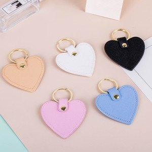 Venta caliente creativo personalizado lindo llavero en forma de corazón multicolor PU llavero de cuero creativo borla llaveros - Product Image 3