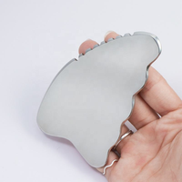 Masseur Gua Sha en acier inoxydable 304 pour le visage, le cou et les épaules