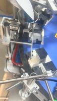 Machine automatique de comptage, de remplissage, de scellage et de cartonnage pour l'emballage de lancettes jetables, de lancettes à prélèvement sanguin et de lancettes de sécurité