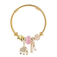 Bracelet en alliage doré incrusté de diamants, style bohème rétro ethnique européen et américain, avec éléphant, papillon et pierres précieuses