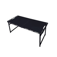 Table pliante multifonctionnelle d'extérieur avec quatre vérins hydrauliques, idéale pour le camping et les pique-niques