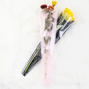 Single rose flower wrapping plastic sleeve shrink wrap net sleeves notebook with plastic shrink sleeves sealing film