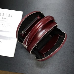 Sac à main rond au design élégant, sac de luxe en cuir véritable pour femme, sac simple et décontracté à porter à l'épaule ou en bandoulière - Product Image 5