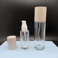 Botella de Vidrio Transparente para Cosméticos y Cuidado de la Piel con Tapa de Madera de Fresno y Pulverizador de Vidrio para Suero y Aceites