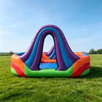 Piscine à mousse gonflable multicolore arc-en-ciel avec tunnel en arc, grand réservoir de jeu gonflable pour événements et locations de fêtes à la mousse en extérieur