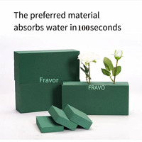 Mousse florale humide verte absorbée par la boue Fleur verte artificielle pour plantes d'intérieur ou décoration murale