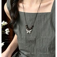 Nouveau Collier Long Polyvalent pour Femme, Style Chinois, en Corde Faite à la Main avec Perles en Bois et Papillon Argenté Vieilli Vintage