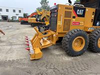 Niveleuse à moteur Caterpillar 140K d'occasion, d'origine américaine, à vendre