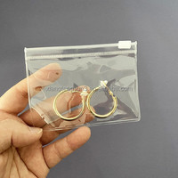 Sac en plastique personnalisé avec logo sacs à poussière de poche clair givré avec fermeture éclair pour bijoux petits sacs d'emballage pour bijoux pochette en pvc pour bijoux