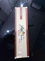 Pochette de luxe écologique à deux poignées, en papier chromo, imprimée quadricolore, avec marquage à chaud et thermoscellage central