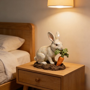 Joli lapin portant une feuille : un compagnon charmant. Cette sculpture a été sculptée et coulée par Bozhiyi. - Product Image 5