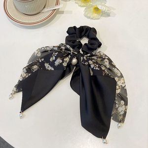 Élastiques à cheveux élégants et colorés à imprimé nœud, longs et ondulés, avec pendentif perle pour femmes, en tissu durable - Product Image 6