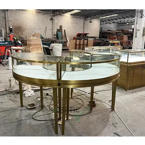 customized luxury standing round metal gold stainless steel jewelry counter diamond display Jewellery cabinet for store design