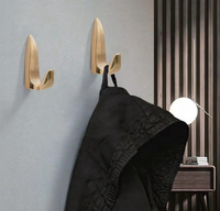 Crochet mural en aluminium moderne et minimaliste à faible MOQ pour vêtements, idéal pour appartement, salle de bain et placard