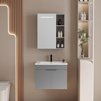 Meuble-lavabo de salle de bain moderne de luxe en acier inoxydable avec miroir intelligent, vasque en céramique et double porte de rangement pour hôtel