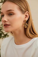 Boucles d'oreilles pendantes tendance pour femme en laiton plaqué or 18 carats avec motif feuille de Monstera et feuille de palmier