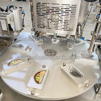 Machine semi-automatique de remplissage et de scellage de coupelles pour biscuits, chocolat et snacks