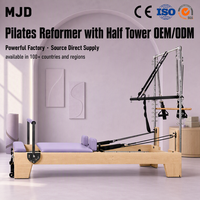 Machine de Pilates Reformer en bois d'érable naturel avec demi-tournebrise pour l'entraînement de Pilates, l'entraînement de mobilité et l'équipement de studio