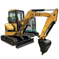 Mini-excavatrice sur chenilles Caterpillar 3 tonnes 303CR 303CCR d'occasion, très demandée